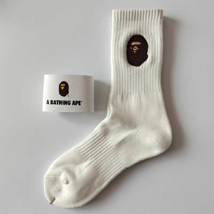 Wholesale Medium length towel bottom socks, high top sports long tube, embroidered white