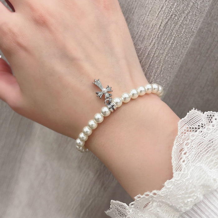 Wholesale Double layered diamond studded cross pearl necklace, niche personality, temperament, high-end feeling, collarbone chain