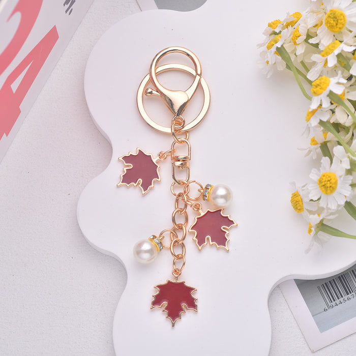 Wholesale Maple Leaf Pearl Pendant Alloy Keychain JDC-KC-Jiax002