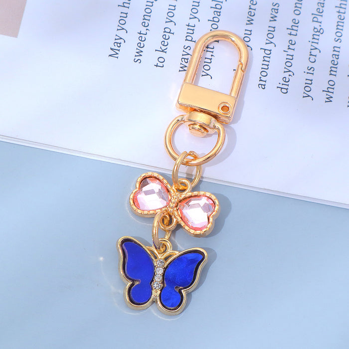 Wholesale Keychain Pendant Creative Alloy Butterfly Headphone Mobile Phone Bag Pendant