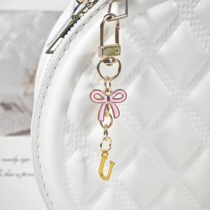 Wholesale Pink bow A-Z keychain alloy accessory