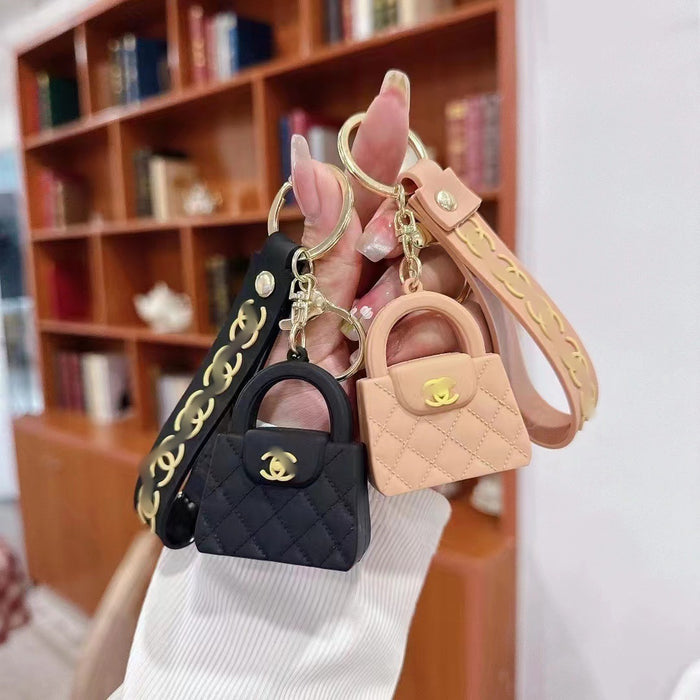 Wholesale Cartoon keychain silicone mini bag pendant car keychain fashion gift