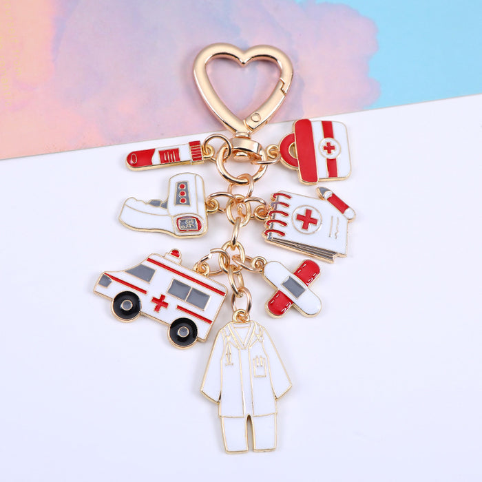 Wholesale Classic nurse cap thermometer ambulance mask nurse suit zinc alloy keychain