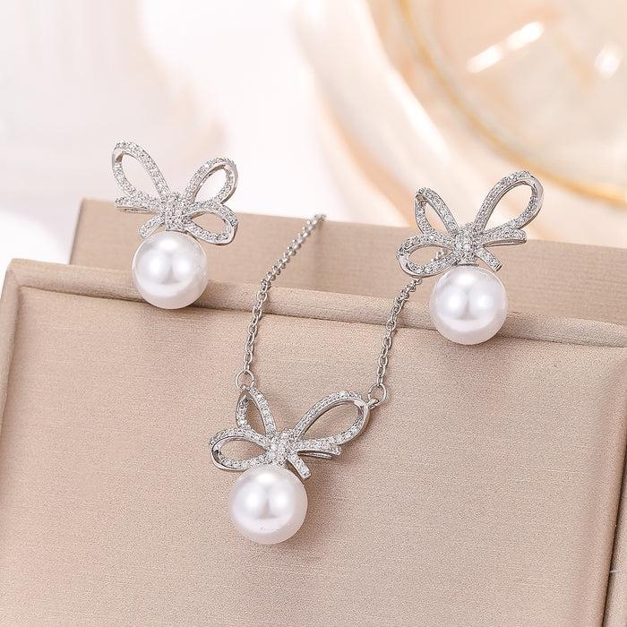 Wholesale Light Luxury Small and Exquisite Elegant Sweet Fashion All-match Women's High-end Bowknot Pearl Necklace Earrings suit