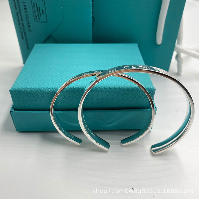 Wholesale Classic open mouth couple bracelet, fashionable concave steel seal letter wide version bracelet