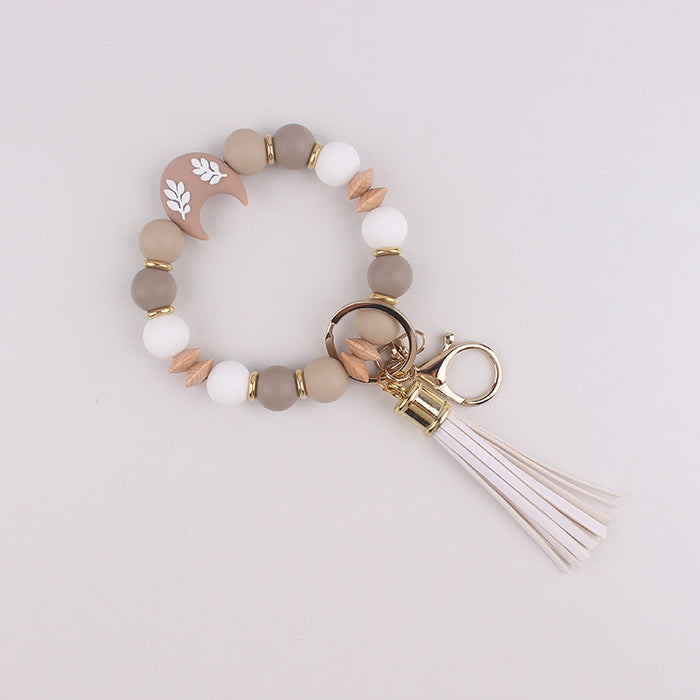 Wholesale Silicone moon beads bag key bracelet bracelet silicone beads beech wood beads tassel keychain