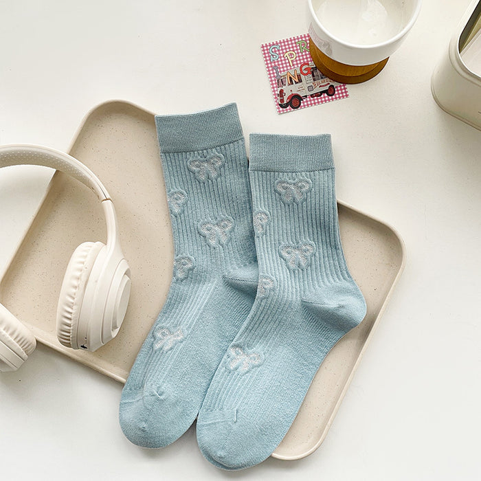 Wholesale Butterfly knot socks, children's mid tube socks, pile socks, boneless long tube socks, fashionable women's socks