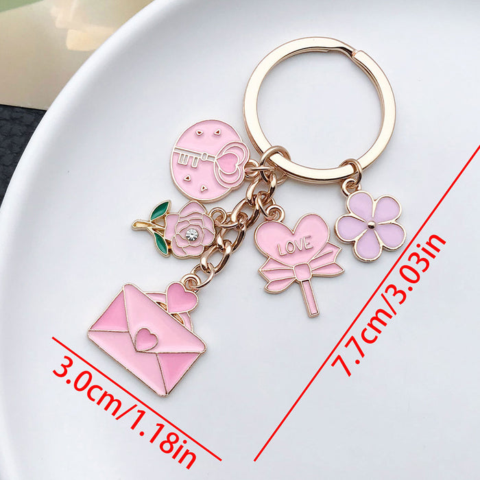 Wholesale Cute pink heart-shaped rose potion metal  keychain