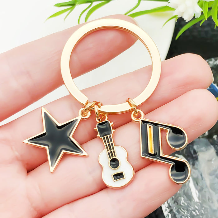 Wholesale oil dripping music guitar keyboard headset microphone star keychain key ring