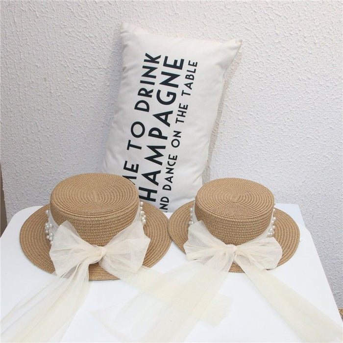 Wholesale Hat Women's Small Fresh Flat-top Straw Hat Pearl Bow Straw Sun Hat Beach Cool Hat