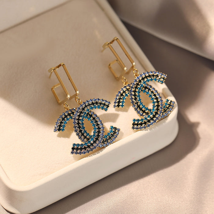 Wholesale New earrings with letter double C-shaped rhinestones inlaid with fashionable light luxury earrings, niche high-end temperament earrings