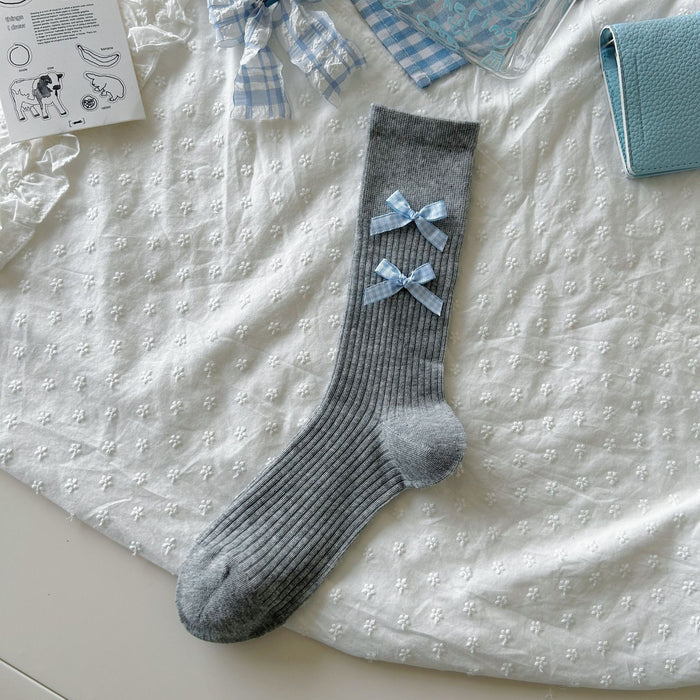 Wholesale Bow tie socks, long tube pile socks