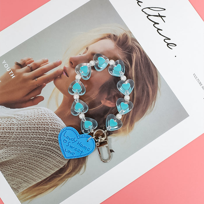 Wholesale fresh simple color love hand chain transparent acrylic chain mobile case accessories