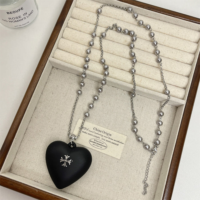 Wholesale Black cross heart pendant necklace, women's light luxury high-end feeling, pearl sweater chain long, versatile accessories for autumn and winter