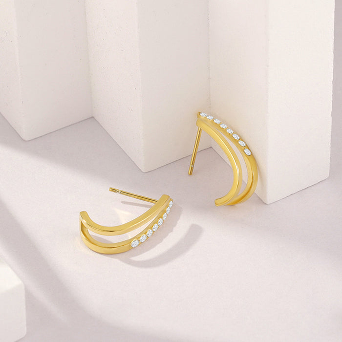 Wholesale Retro style hollow gold lines circular stainless steel earrings electroplated with diamond studded metal earrings