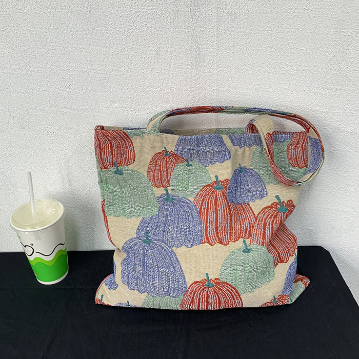 Wholesale Artistic retro pumpkin embroidery jacquard fabric shoulder bag with niche design