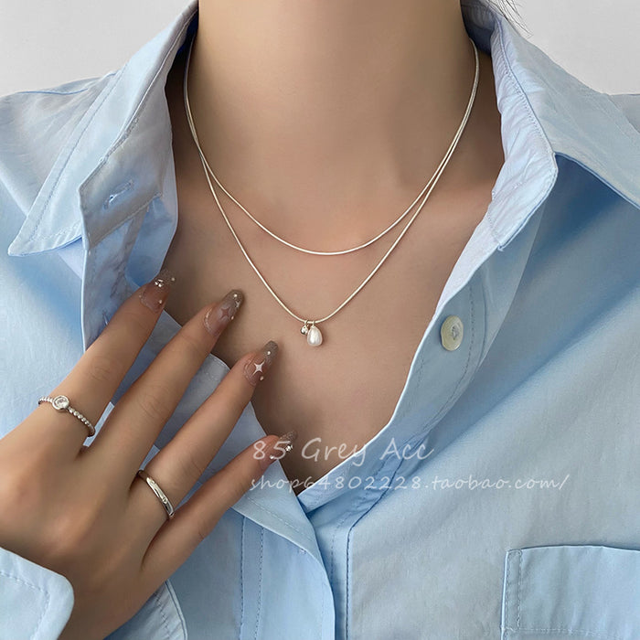 Wholesale Double layered pearl necklace for women, niche, light luxury, fashionable, collarbone chain, temperament, simple necklace