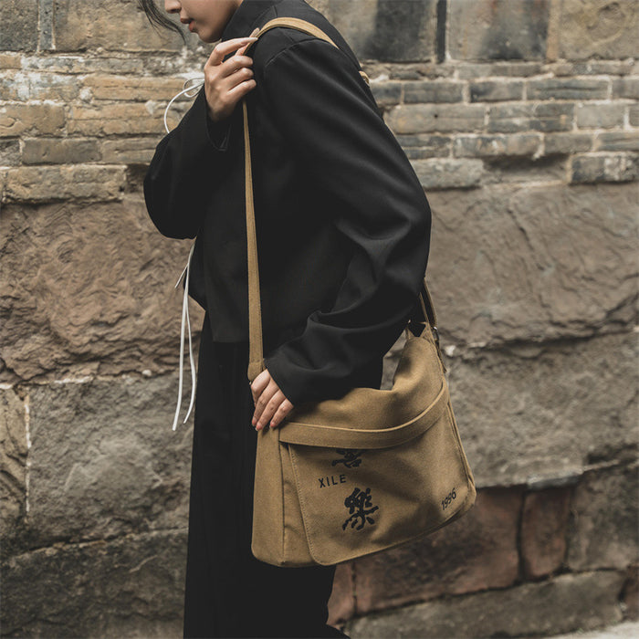 Wholesale Crossbody bag, new high-end backpack, large capacity canvas mailman bag, couple's casual shoulder bag, women's shoulder bag