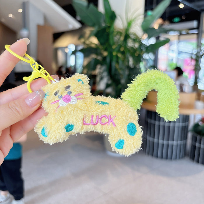 Wholesale Creative cartoon polka dot leopard doll keychain DIY twist tail decompression doll student pendant