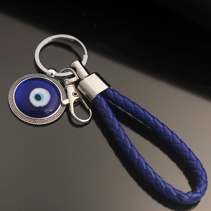 Wholesale Blue eyed blank metal keychain and chain gift keychain, fashionable and versatile