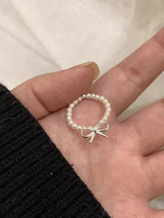 Wholesale Bow pearl ring for women, light luxury, exquisite and high-end index finger ring, adjustable index finger ring