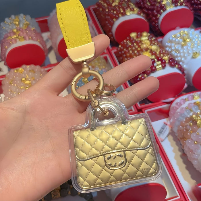 Wholesale Cute gold-colored bag keychain