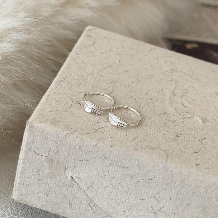 Wholesale Compact and minimalist leaf earrings with delicate and niche design, featuring metal leaf earrings