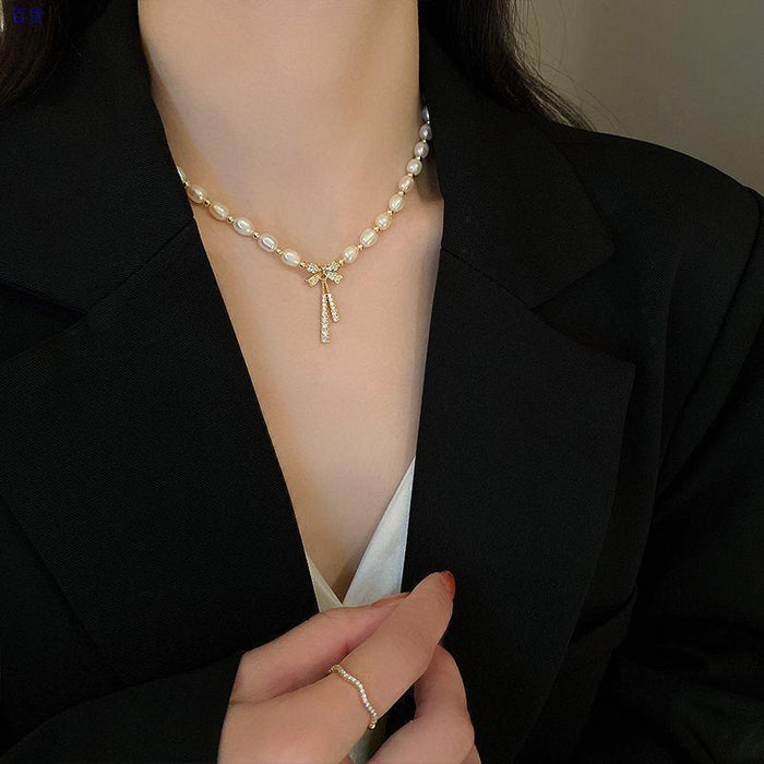 Wholesale New bow pearl pendant necklace with a light luxury and niche design, featuring a collarbone chain and elegant neck chain