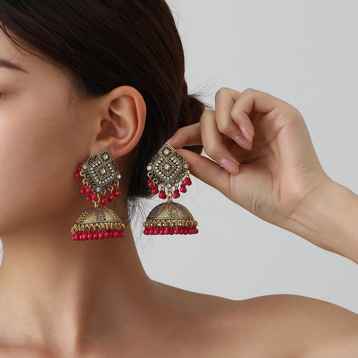 Wholesale vintage style pearl-studded rhinestone bell earrings with tassels