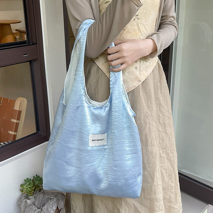 Wholesale Small niche design, environmentally friendly silver shoulder bag, large capacity leisure commuting shopping bag, handheld