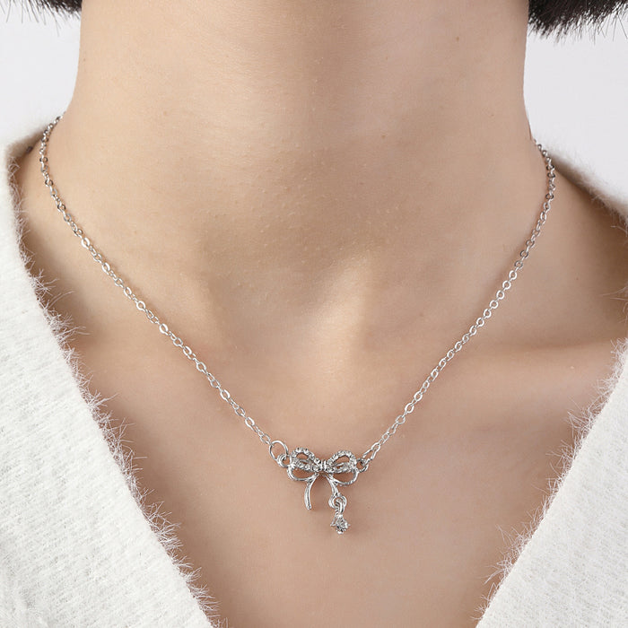 Wholesale Bow necklace, silver geometric pendant with diamond inlay design, versatile accessory