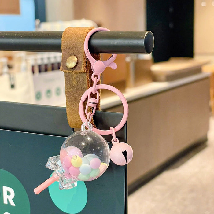 Wholesale Creative oil colored bead lollipop keychain cute cartoon car couple bag pendant small gift