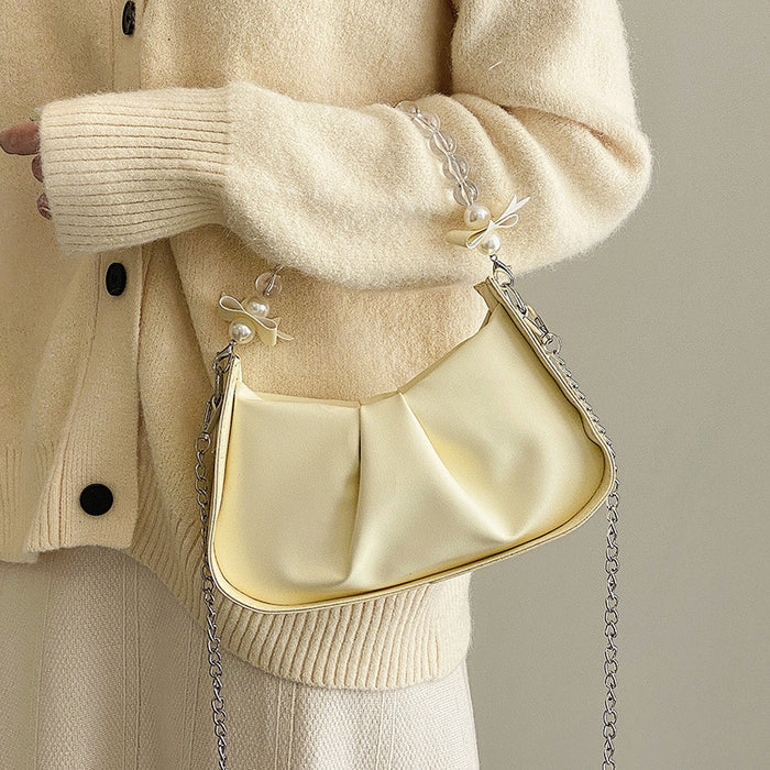 Wholesale Popular pleated new fashion pearl chain shoulder crossbody bag, saddle bag