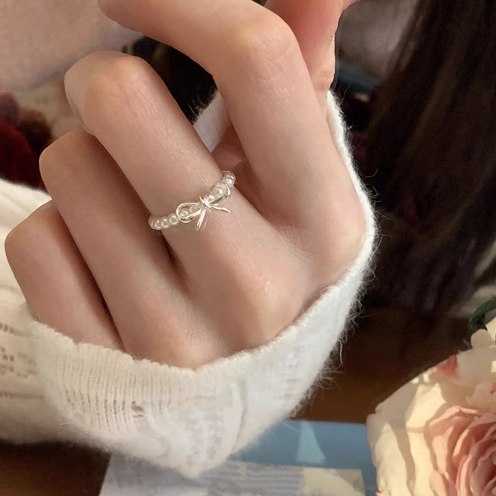 Wholesale Bow pearl ring for women, light luxury, exquisite and high-end index finger ring, adjustable index finger ring