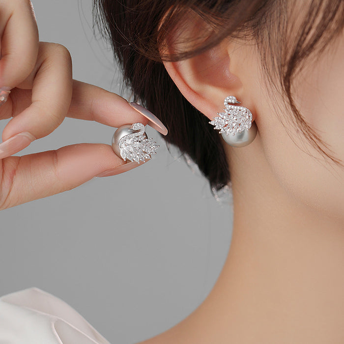 Wholesale Swan full diamond zircon pearl earrings, light luxury and high-end earrings, new silver needle fashionable and personalized earrings for women