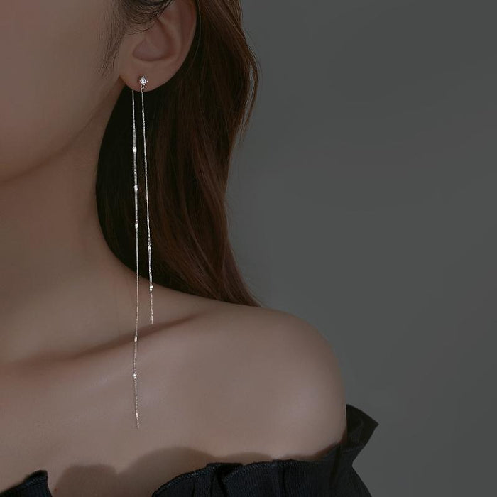 Wholesale Pure silver long tassel earrings, niche, high-end, temperament, ear string, earring chain