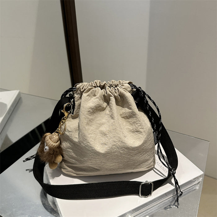 Wholesale Lightweight sports shoulder crossbody bag, casual large capacity, fashionable pleated bucket bag