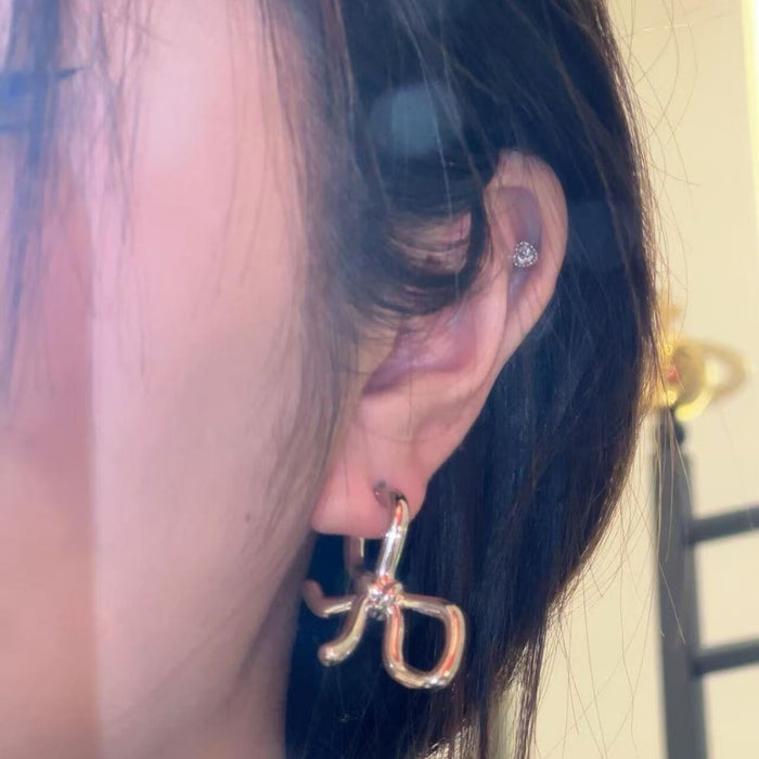 Wholesale Women' s Planet Bow Earrings