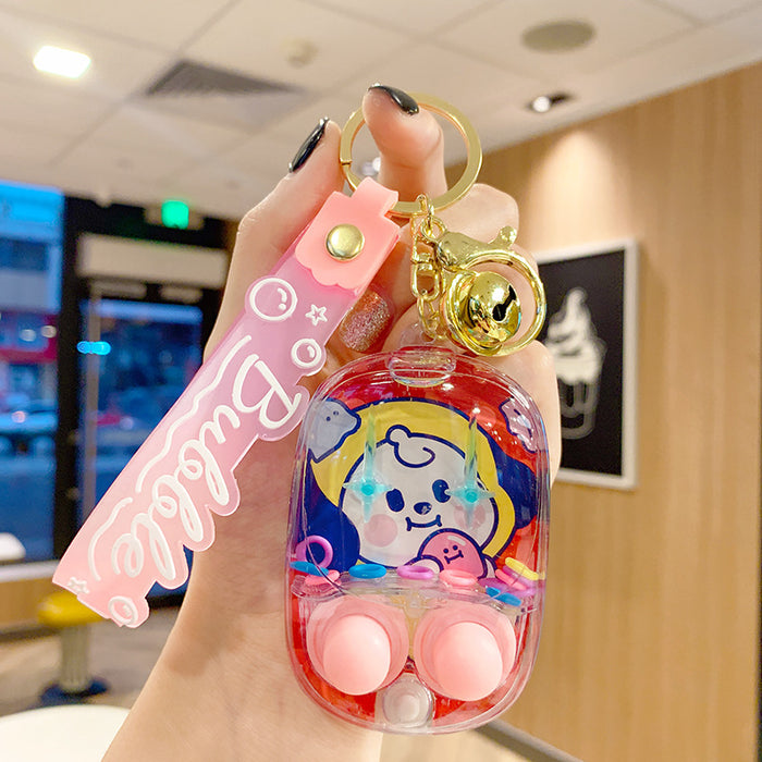 Wholesale water ring game machine key chain hanging decoration decompression toy gift keychain small pendant doll