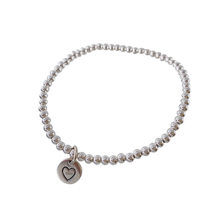 Wholesale Pure silver heart-shaped round bead bracelet with a new niche design, high-end feel, and light luxury bracelet accessories