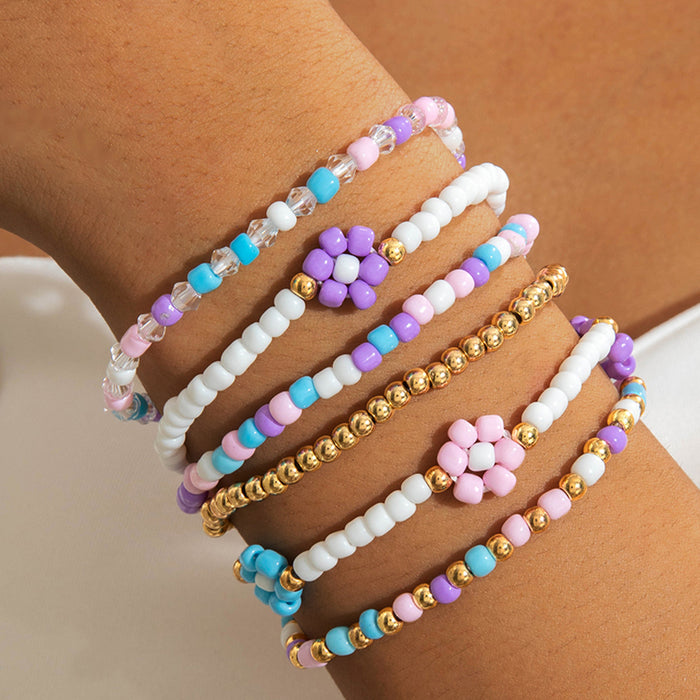 Wholesale Bohemian rice beaded multi-layer stacking elastic bracelet niche contrast color women' s bracelet set