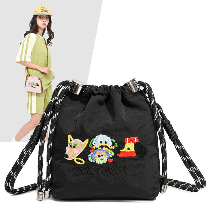 Wholesale Embroidered cartoon niche bucket bag, new versatile nylon cloth shoulder crossbody bag, mobile phone bag