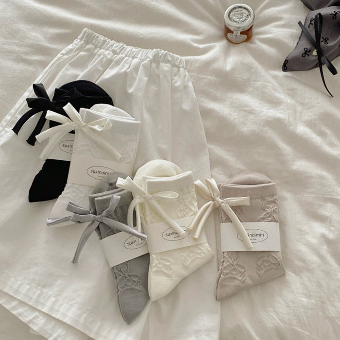 Wholesale Bow shaped mid tube socks with boneless pile socks