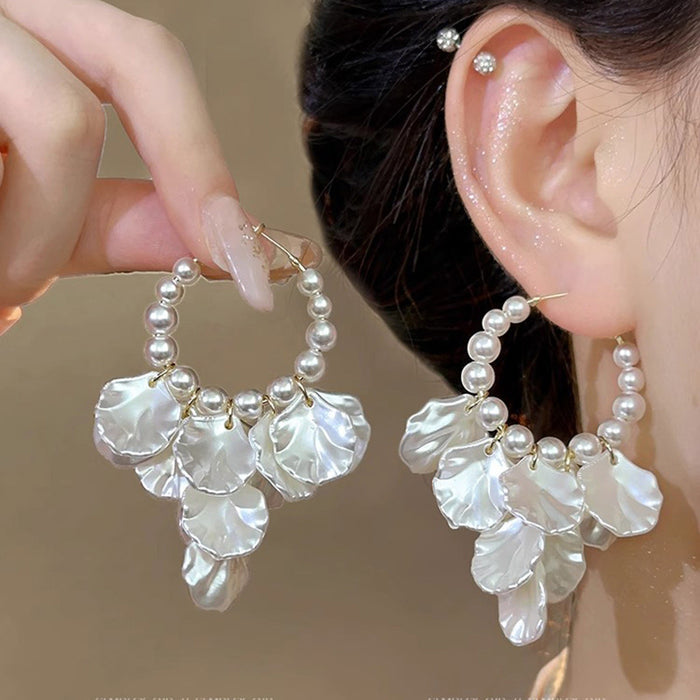 Wholesale Silver needle petal pearl earrings with a light luxury temperament, shell tassel earrings