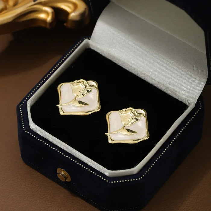 Wholesale Vintage rose silver needle earrings autumn and winter new item niche painting oil rose flower wholesale