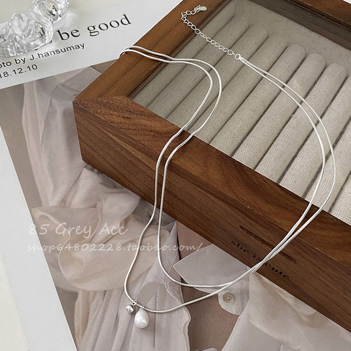 Wholesale Double layered pearl necklace for women, niche, light luxury, fashionable, collarbone chain, temperament, simple necklace