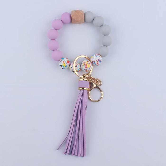 Wholesale Silicone leopard beads wrist keychain pendant leather PU tassel beaded bracelet accessories