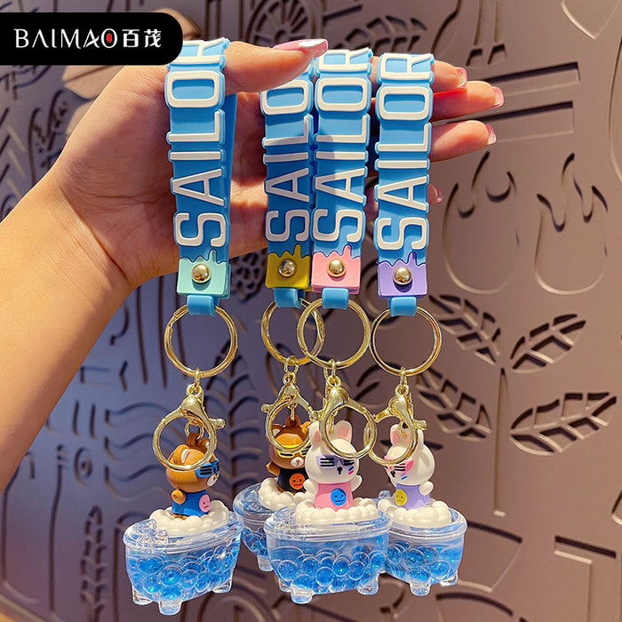 Wholesale Creative cartoon oiled liquid keychain figurine keychain couple bag pendant