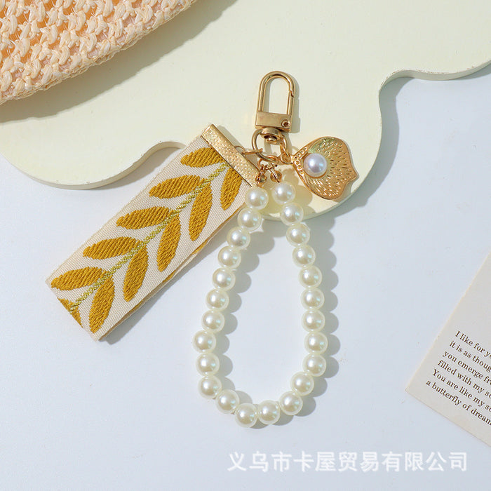Wholesale Ribbon car alloy keychain pendant creative leaf striped pearl accessory bag decoration