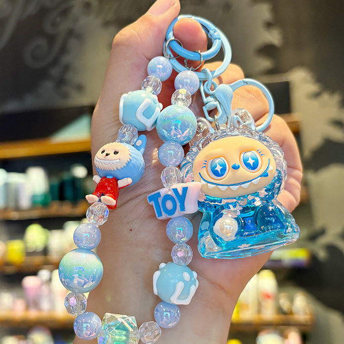 Wholesale Crystal oil-filled bottle keychain backpack charm